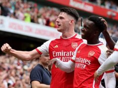 Arsenal survive late scare to triumph on first day