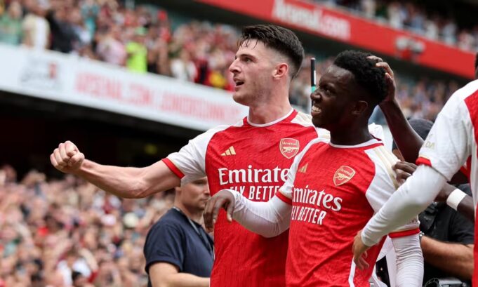 Arsenal survive late scare to triumph on first day  Â