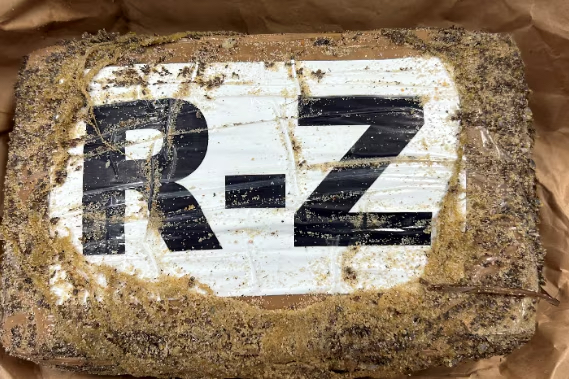 package of cocaine with the letters R and Z written on a white background