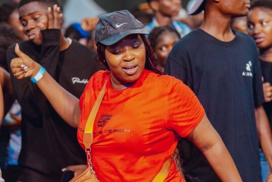 African teen seen dancing at a TeensRave festival
