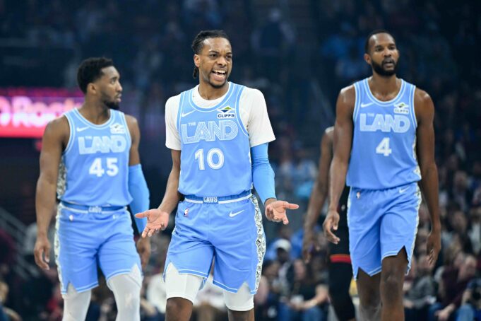 Cavaliers clinch playoff berth with 12th straight win over Heat