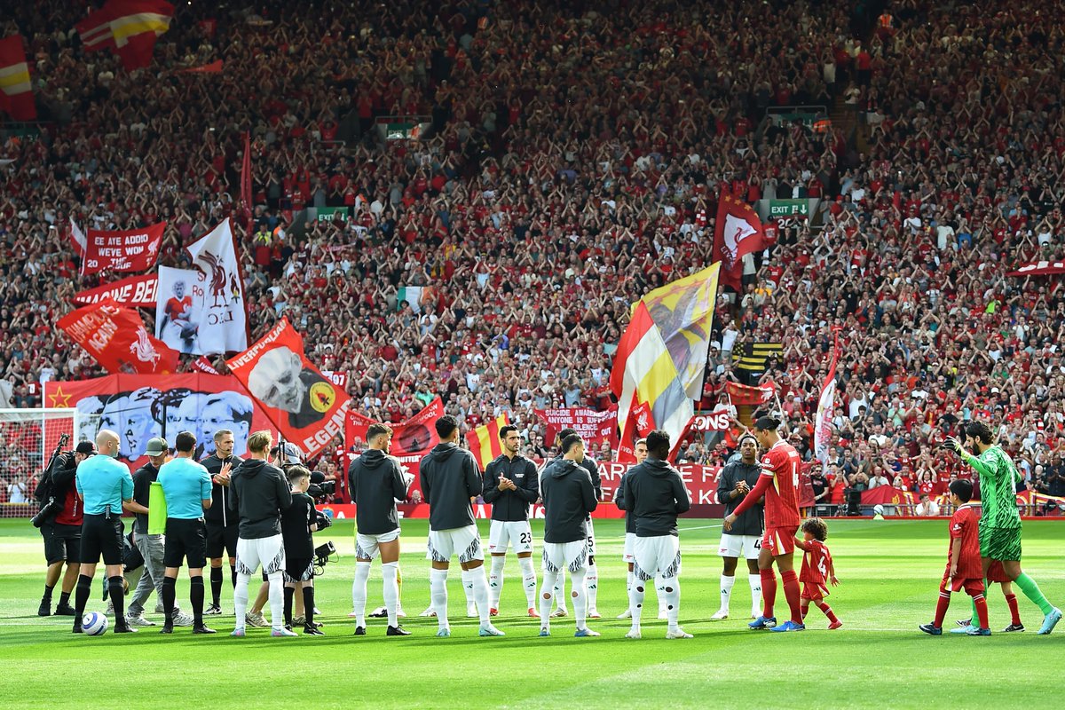 Arsenal fight back to deny Champions Liverpool at Anfield